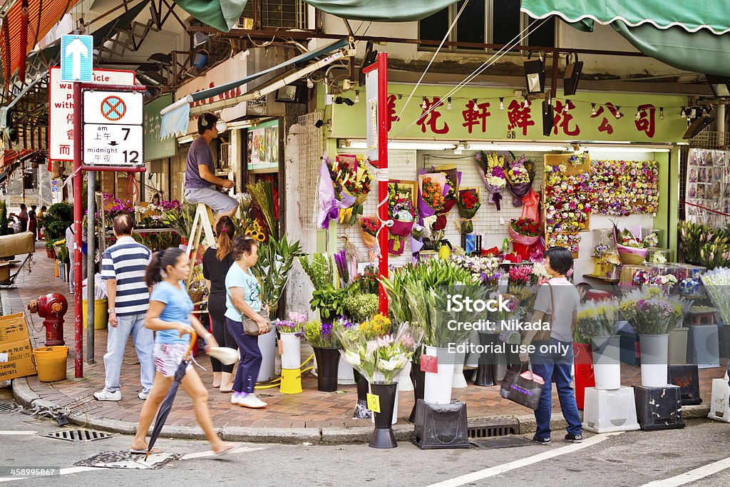 Planta compras em Hong Kong - Foto de stock de Calçada royalty-free