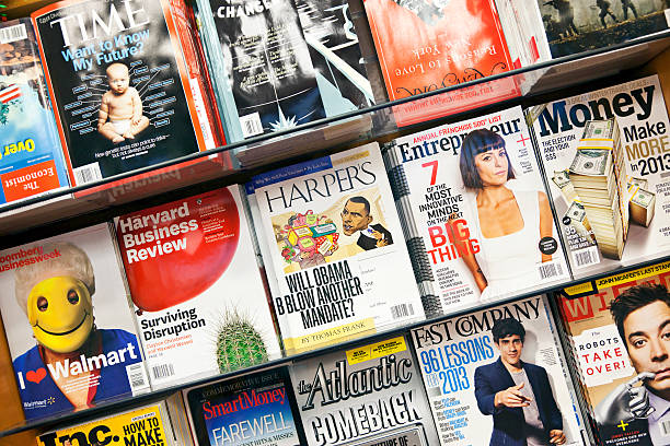 Stack of magazines # 14 XXXL "New York City, USA - December 17, 2012: Stack of popular magazines on the outside of the street side newsstand on Broadway Upper West. Time, Harvard Business Review, Money, entrepreneur, Harper's and New York magazines can be seen." news stand stock pictures, royalty-free photos & images