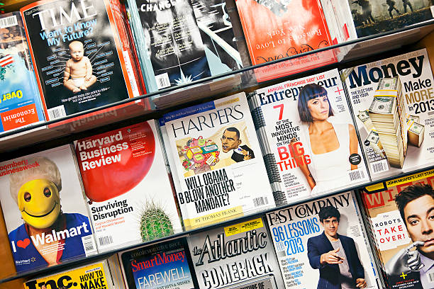 Stack of magazines # 14 XXXL "New York City, USA - December 17, 2012: Stack of popular magazines on the outside of the street side newsstand on Broadway Upper West. Time, Harvard Business Review, Money, entrepreneur, Harper's and New York magazines can be seen." newspaper titles stock pictures, royalty-free photos & images