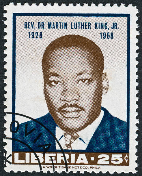 Martin Luther King Jr. Stamp "Richmond, Virginia, USA - December 7th, 2012: Cancelled Stamp From Liberia Featuring The Black Civil Rights Leader, Martin Luther King Jr." minister clergy photos stock pictures, royalty-free photos & images