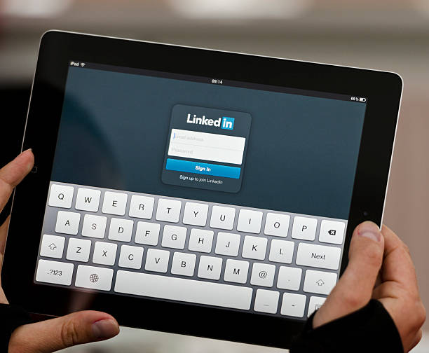 iPad device with Linkedin screen stock photo