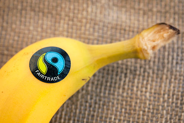 fairtrade banana macro - social media marketing branding sign fotografías e imágenes de stock