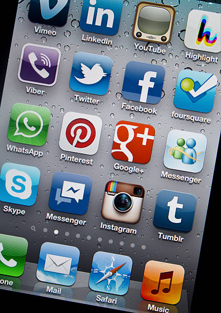 Pinterest and Social Media Applications on iPhone 4S "Istanbul, Turkey - February 24, 2012: Apple Iphone screen with social media applications including Pinterest, Google Plus, Facebook, Twitter, Foursquare, Instagram,Tumblr,Linkedin, Highlight, Skype, Youtube and Vimeo." pinterest stock pictures, royalty-free photos & images