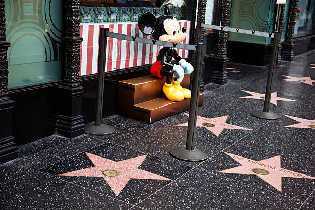 Hollywood Walk Of Fame Star Mickey Mouse "Hollywood, California, USA - February 5, 2013: Hollywood Walk Of Fame Mickey Mouse achievement in the entertainment industry star." winnie the pooh photos stock pictures, royalty-free photos & images