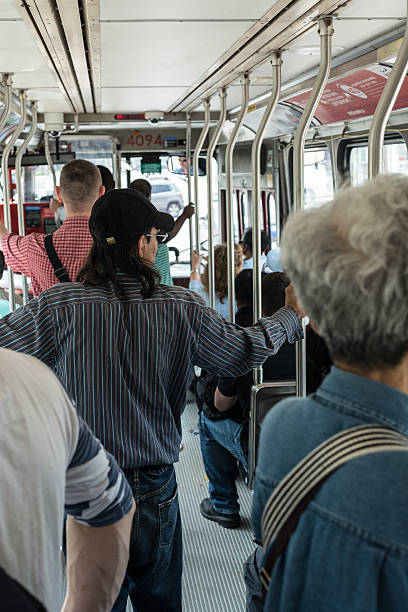 Street Car Interior "Toronto, Canada - May 22, 2012: Passengers on board a Toronto Transit Commission street car in the city's downtown core." sustainable energy toronto stock pictures, royalty-free photos & images