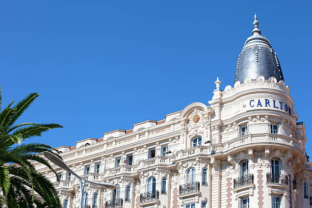 Famous Intercontinental hotel in Cannes, France "Cannes, France - September 22, 2012: View of the famous corner dome of the Intercontinental Hotel on the Croisette promenade in Cannes, France" cannes film festival stock pictures, royalty-free photos & images