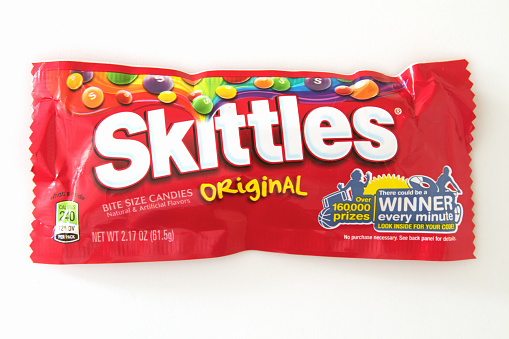 Liberty Township, USA - February 20, 2012: A photo on a white background of a package of Skittles candy made by Wm. Wrigley Jr. Company.