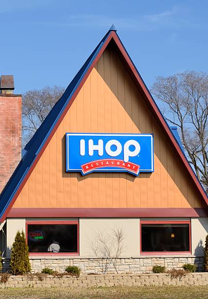 IHOP (International House of Pancakes) "Royal Oak, Michigan, USA - February 28, 2012: The IHOP (International House of Pancakes) on Woodward in Royal Oak, Michigan with people dining. Founded in California in 1958, IHOP is a nationwide chain of casual dining restaurants with over 32,000 employees." Ihop stock pictures, royalty-free photos & images