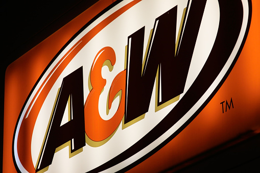 Edmonton, Canada - February 14, 2012: A close-up shot of an A&W fast food restaurant\\'s backlit, illuminated sign. A&W first opened in 1956 and today has over 700 locations across Canada.