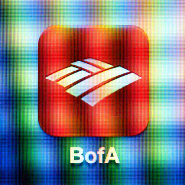 Bank of America Kyiv, Ukraine - March 25, 2012: Close-up of the Bank of America application icon on the screen of the iPhone 4. bank-of-america stock pictures, royalty-free photos & images