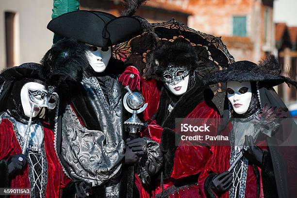 Four Masks Posing 2013 Carnival Venice Italy Stock Photo - Download Image Now - Adult, Adults Only, Architecture