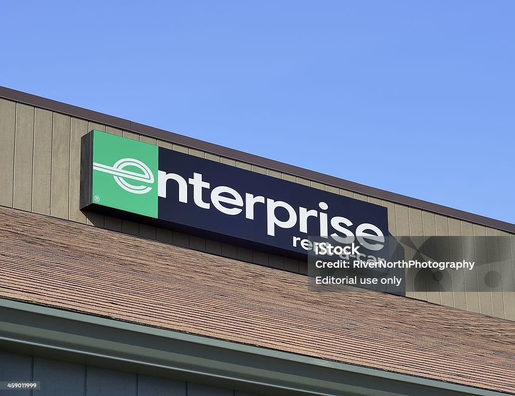 Enterprise Rent-A-Car "Rochester, Michigan, USA - February 23, 2012: The Enterprise Rent-A-Car location on Rochester Road in Rochester Hills, Michigan. Founded in 1957, Enterprise Rent-A-Car is the largest car rental service in the US with revenues of over $12 Billion." Car Rental Stock Photo