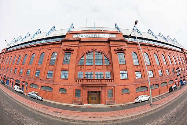 Ibrox Stadium, Glasgow "Glasgow, UK - March 26, 2013: The Bill Struth Main Stand and main entrance at Ibrox Stadium, Glasgow, the home ground of Glasgow Rangers Football Club. The main stand was built in 1928 with an impressive red brick facade." ibrox stock pictures, royalty-free photos & images