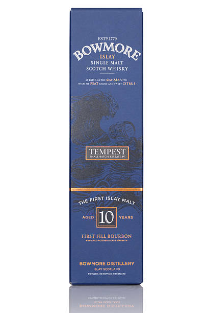 Bowmore Tempest "Bayreuth, Germany aa March 10, 2013: Tube of a 10 years old scotch single malt whisky from the distillery Bowmore, that is situated at the Scottish isle Islay. Edition Tempest" bowmore whisky stock pictures, royalty-free photos & images