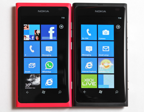 Hong Kong, Hong Kong - July 15, 2012: Microsoft Windows 7.5 smart phone, Nokia Lumia 800 in pink and black