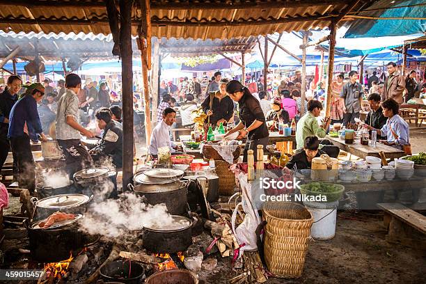 People Eating At A Street Market In Vietnam Stock Photo - Download Image Now - Vietnam, Street Food, Ethnicity