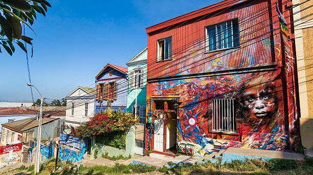 Houses Covered with Graffiti on Cerro Concepción in Valparaiso, Chile "Valparaiso, Chile - January 9th. 2013: Houses covered with elaborate graffiti in Cerro ConcepciAn in Valparaiso, Chile" valparaiso chile stock pictures, royalty-free photos & images