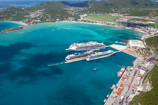 Philipsburg, St. Maarten, Dutch West Indies - October 24, 2012: aerial view of four cruise ships at the dock: Norwegian Gem; Celebrity Summit, Oasis of the Seas and Carnival Dream
