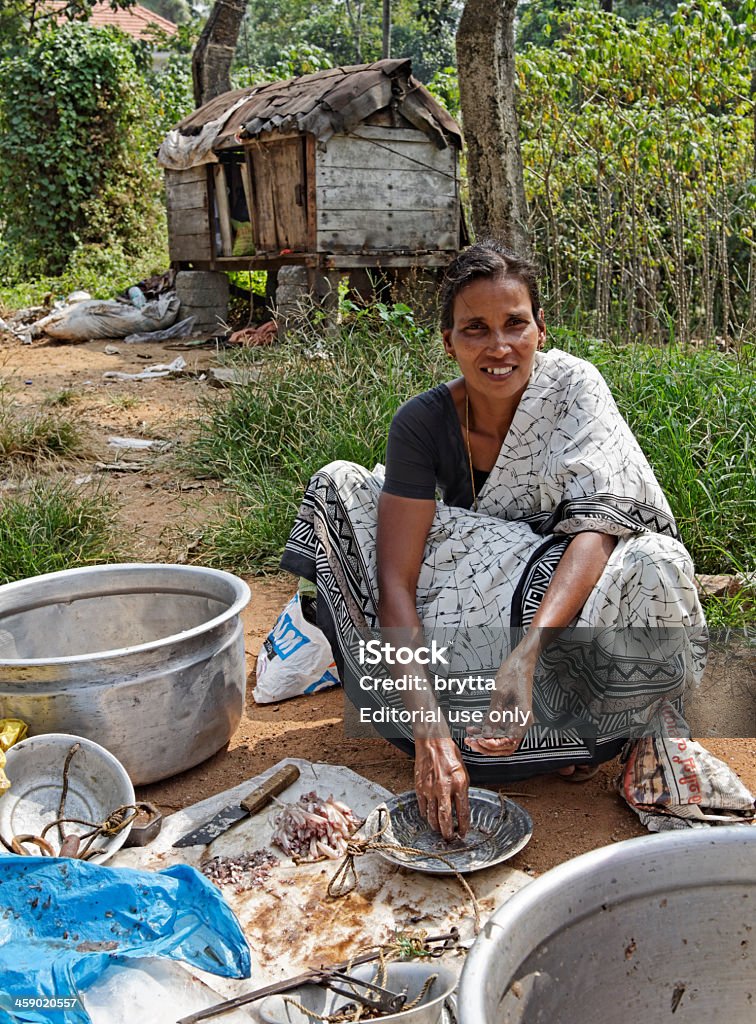 Poissons femme vente - Photo de Accroupi libre de droits