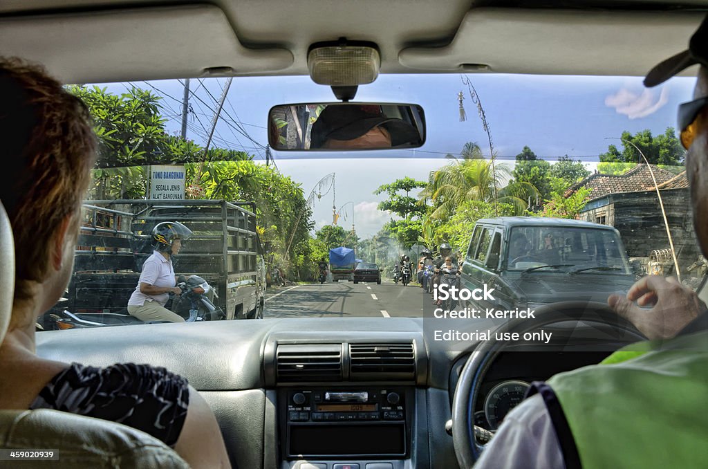 Touristen fahren im Auto durch Bali, Indonesien - Lizenzfrei Asien Stock-Foto