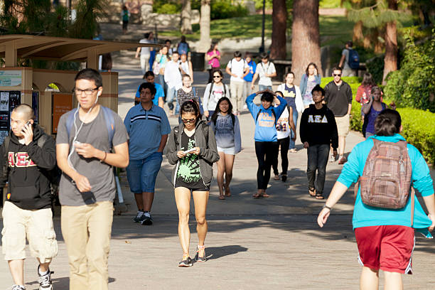 University of California, Los Angeles Los Angeles, California, USA - June 13, 2012. The location is University of California, Los Angeles. Large group of students walking about at the University campus. ucla photos stock pictures, royalty-free photos & images