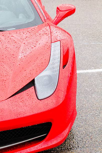 Zandvoort, The Netherlands - June 24, 2012: Rain covered Ferrari 458 Italia front view. The car is on display during the 2012 Italia a Zandvoort day.