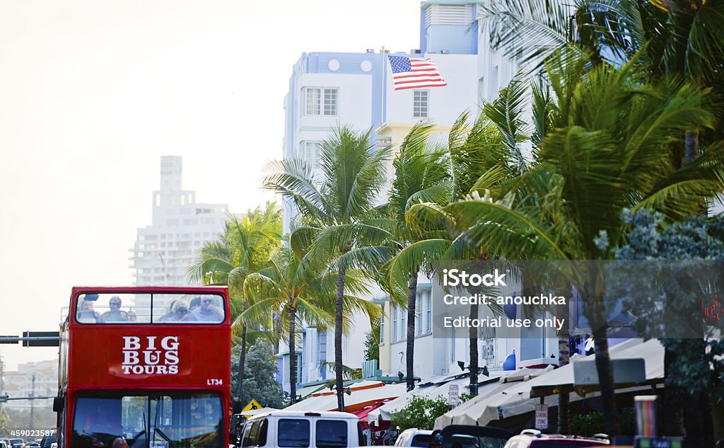 Red Double Decker Tour Bus on ocean Drive, Miami Beach "Miami Beach, USA  - January 9, 2013: Red Double Decker Tours Bus  with tourists on Ocean Drive, Miami Beach" Art Deco District - Miami Stock Photo