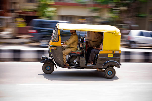 Speeding Auto Rickshaw stock photo