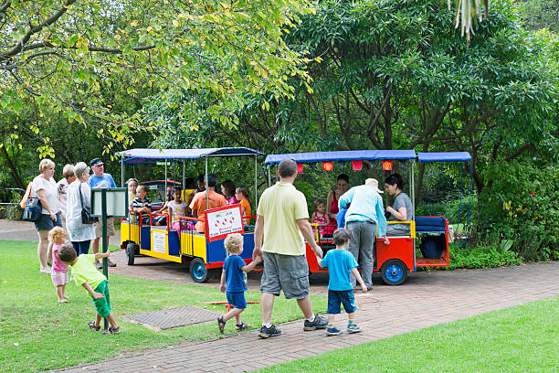 Roodepoort, South Africa - March, 29th 2013: Walter Sisulu Botanical Gardens in Roodepoort showing a Mini train providing people with an easy ride to the main gate. This is a pupular park where whole families can enjoy a relaxing day outdoors. These gardens feature a waterfall and wildlife of more than 220 species of birdlife.