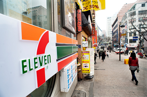 Seoul, South Korea - April 10, 2012: Street scene in Seoul, South Korea featureing a 7-11 franchise store.