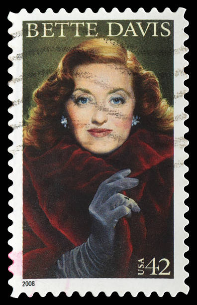 Bette Davis "Beijing, China - September 13, 2012: US postage stamp Bette Davis (1908aa1989), American film, television and stage actress." blond hair fine art portrait portrait women stock pictures, royalty-free photos & images