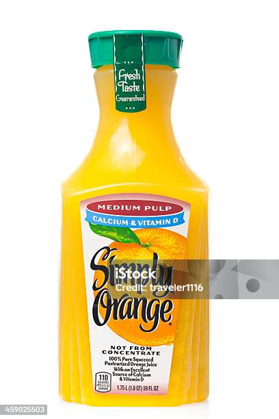 Simplemente Jugo De Naranja Foto de stock y más banco de imágenes de Botella - Botella, Zumo de naranja, Naranja - Color