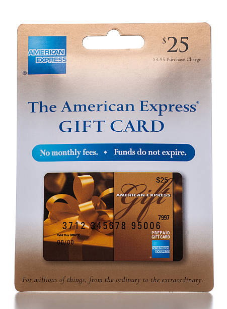 American Express Gift Card display packaging "Miami, USA - December 11, 2012: American Express $25 Gift Card display packaging. American Express brand is owned by the American Express Company alson known as AmEx." american express stock pictures, royalty-free photos & images
