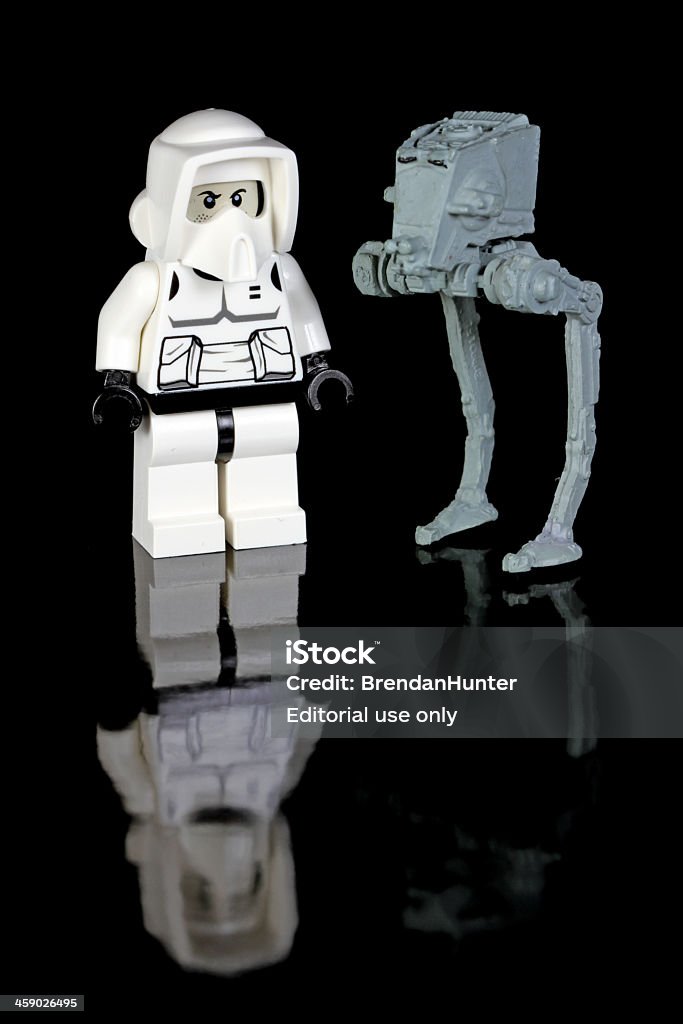 Natural Partners Vancouver, Canada - December 2, 2012: A Lego Stormtrooper and AT-ST from the Star Wars film franchise, posed against a black background. Armed Forces Stock Photo