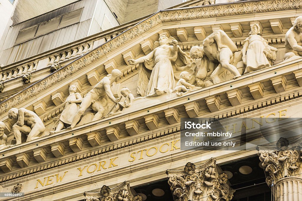 New York Stock Exchange NYSE, NYC, USA "New York City, United States - May 12, 2012: A New York Stock Exchange (NYSE) facade, located on 11 Wall Street, Lower Manhattan, New York City, USA. NYSE is operated by NYSE Euronext." Architecture Stock Photo