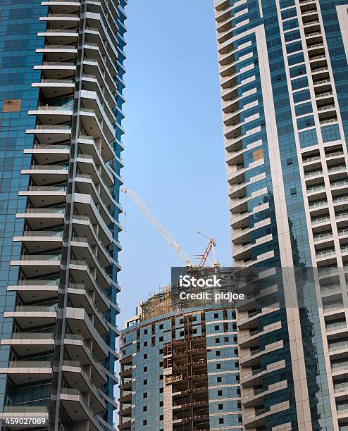 Skyscraper Construction Site Stock Photo - Download Image Now - Apartment, Arabia, Architectural Column