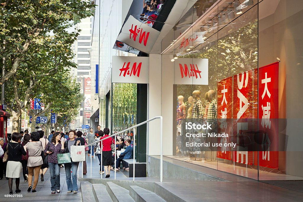 H &M 中に上海,中国 - 25セント硬貨のロイヤリティフリーストックフォト