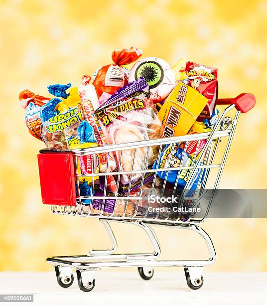 Shopping For Halloween Candy Stock Photo - Download Image Now - Shopping Cart, Snack, American Culture