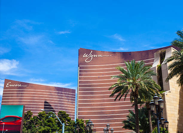 Wynn and Encore "Las Vegas, USA - March 25, 2013: A photo of the Encore and Wynn hotel and casino in Las Vegas.Encore is a luxury resort, casino and hotel located on the Las Vegas Strip in Paradise, Nevada. The resort is connected to its sister resort, Wynn Las Vegas; both are owned by Wynn Resorts Limited, headed by casino developer Steve Wynn." wynn las vegas stock pictures, royalty-free photos & images