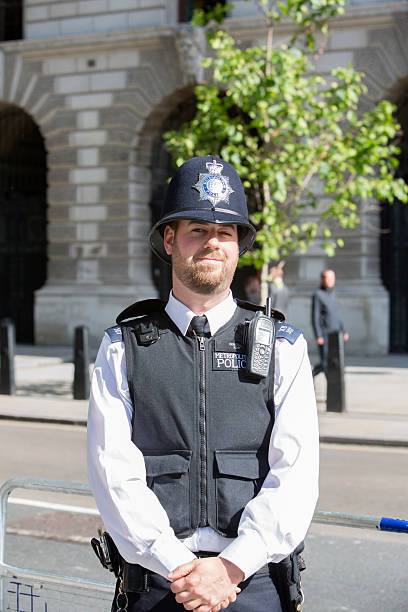 25th May 2021: Iconic New Scotland Yard rotating sign outside the Metropolitan Police headquarters in the English capital city of London. Located by Victoria Embankment in the borough of Westminster, the police force head office has been located here since 2016. A sandstone wall with 'Metropolitan Police' engraved on the wall surrounds the front of the building, which is the public entrance for those coming to the police station.