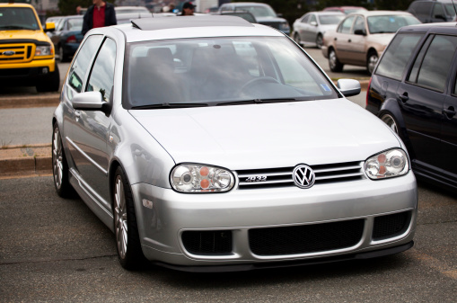 Berlin, Germany - September 10, 2013: Compact convertible car Volkswagen Golf in the city street.