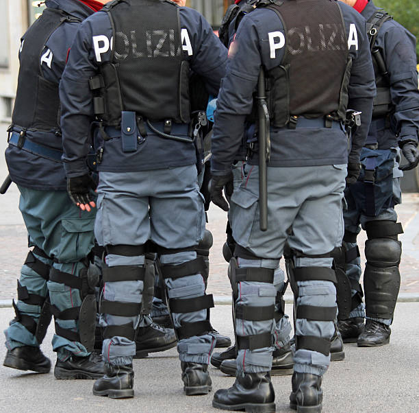 istock policemen with bullet-proof jacket and the baton 459034177