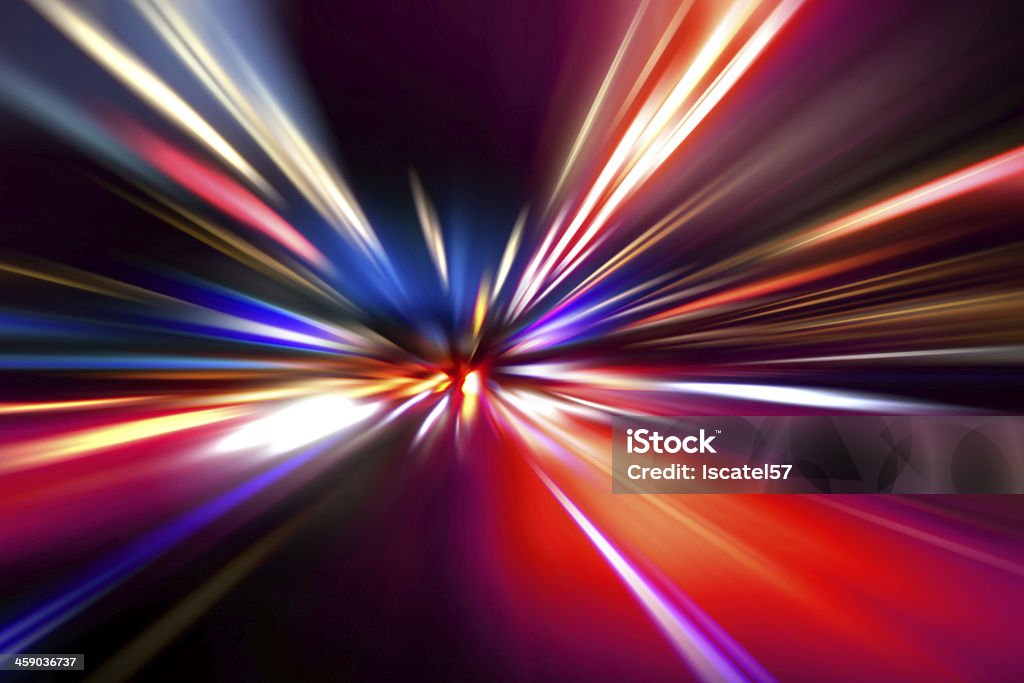 Flashes of bright lights heading towards a central point acceleration speed motion on night road Zoom Effect Stock Photo