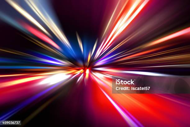 Flashes Of Bright Lights Heading Towards A Central Point Stock Photo - Download Image Now