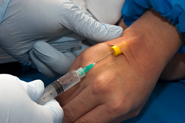 istock Nurse Giving Patient an Injection 459037805