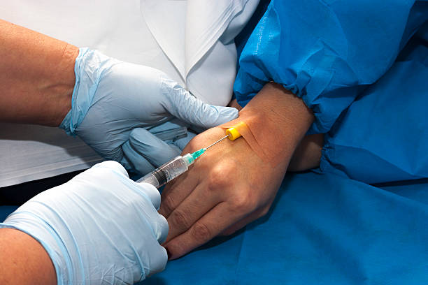 istock Nurse Giving Patient an Injection 459037903