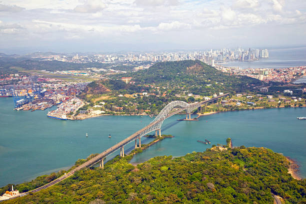 Aerial view; Bridge of the Americas, Panama Aerial view of the Bridge of the Americas at the Pacific entrance to the Panama Canal with Panama City in the background. panama city panama stock pictures, royalty-free photos & images