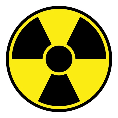 Round radiation warning sign on white background