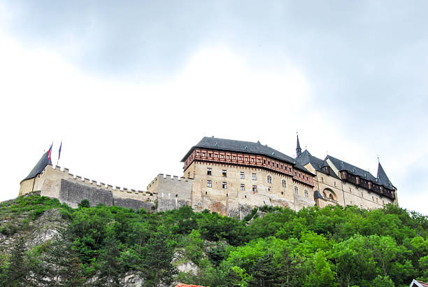 istock Karlstejn castle on green hill, Prague 459056535
