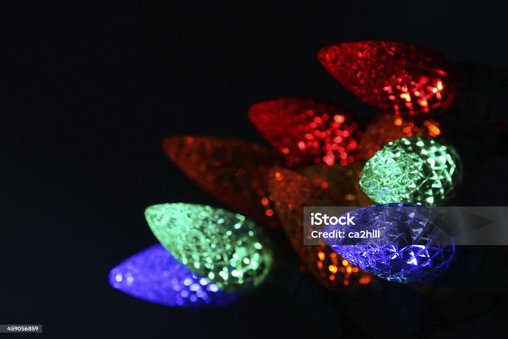Multi-colorato Natale Fascio di luce - Foto stock royalty-free di Attrezzatura per illuminazione